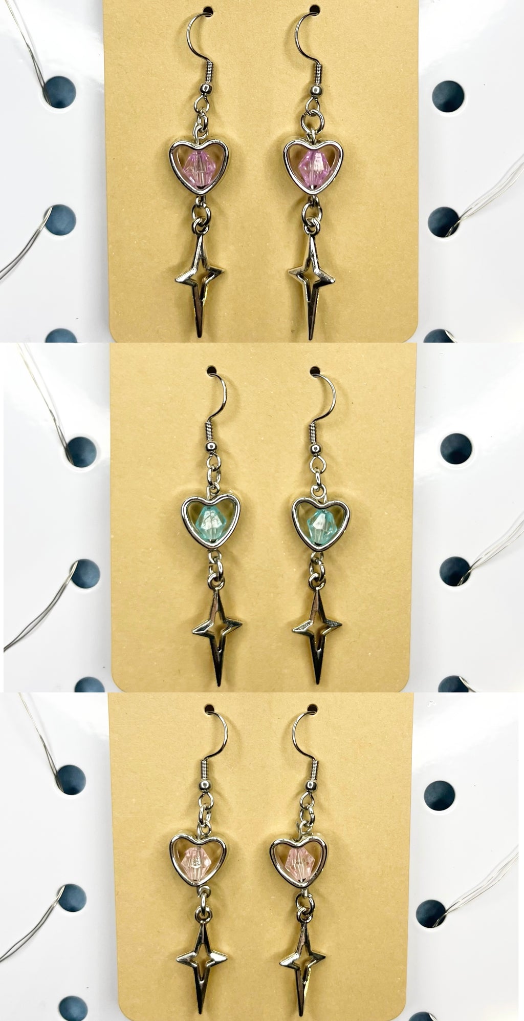 Kolczyki z motywem serc w różnych wariantach kolorystycznych